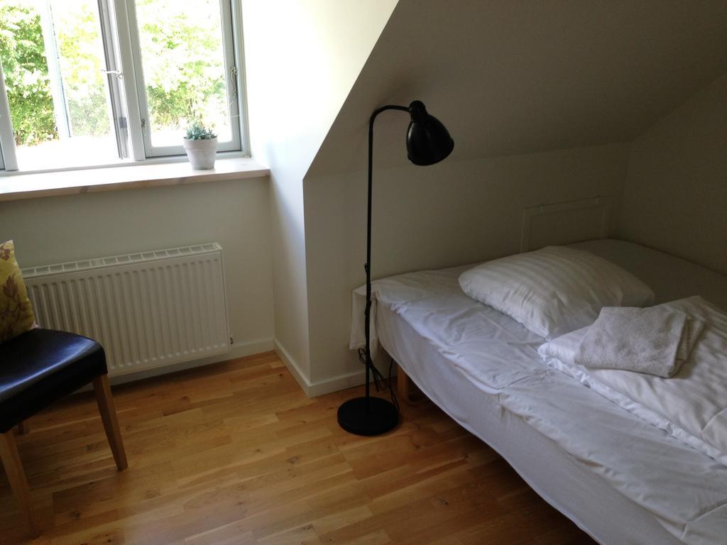 Kirke Saby Forsamlingshus Motel Rom bilde